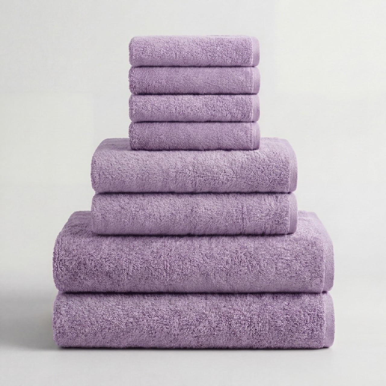 Kemet Cotton Reserve Essential Bundle in Lilac: folded 700 GSM Egyptian cotton bath towels, hand towels and washcloths