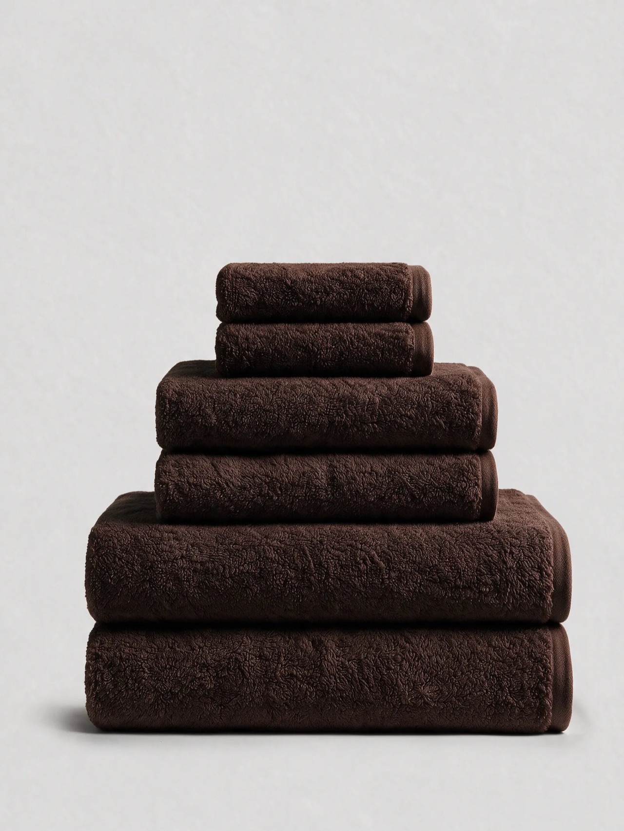 Kemet Cotton Reserve Essential Bundle in Dark Brown: folded bath towels, hand towels and washcloths in 700 GSM Egyptian cotton
