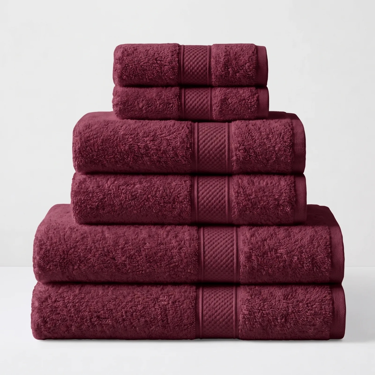 Kemet Cotton Christmas Essential Bundle in Maroon: two bath towels, two hand towels and two washcloths in deep garnet red Egyptian cotton