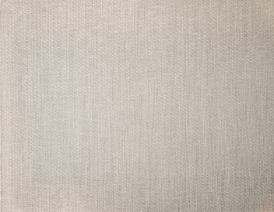Close-up of matte plain-weave cotton showing the tight one-over, one-under structure of percale