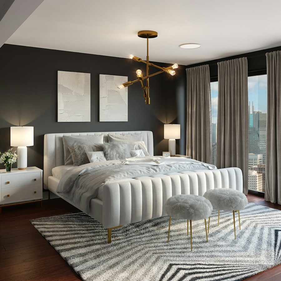Bed made with softly draped sateen-style bedding showing the heavier, more luxurious drape of the weave