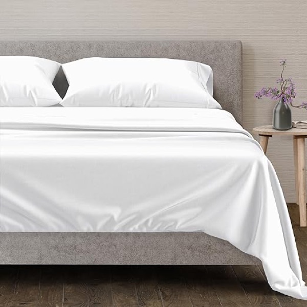 Mayfair Linen white Egyptian cotton sheet set on an upholstered bed
