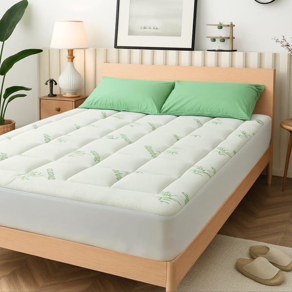 Puravi bamboo mattress topper on a queen bed, from the trypuravi.shop listing