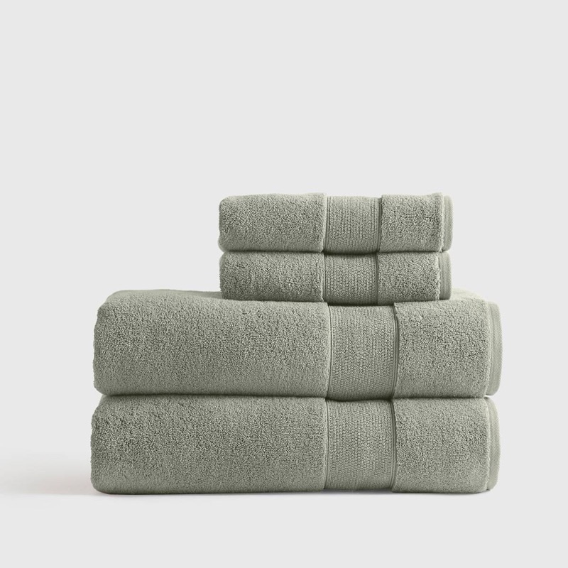 Quince organic Turkish cotton bath sheets and towels stacked in sage